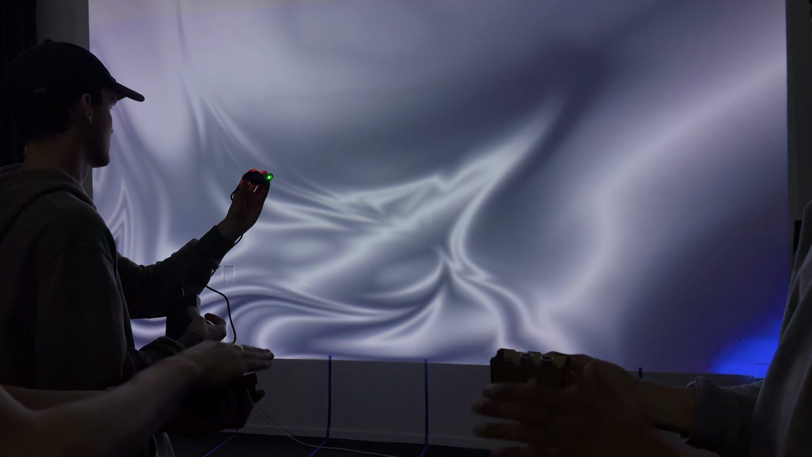 Person interacting with projection